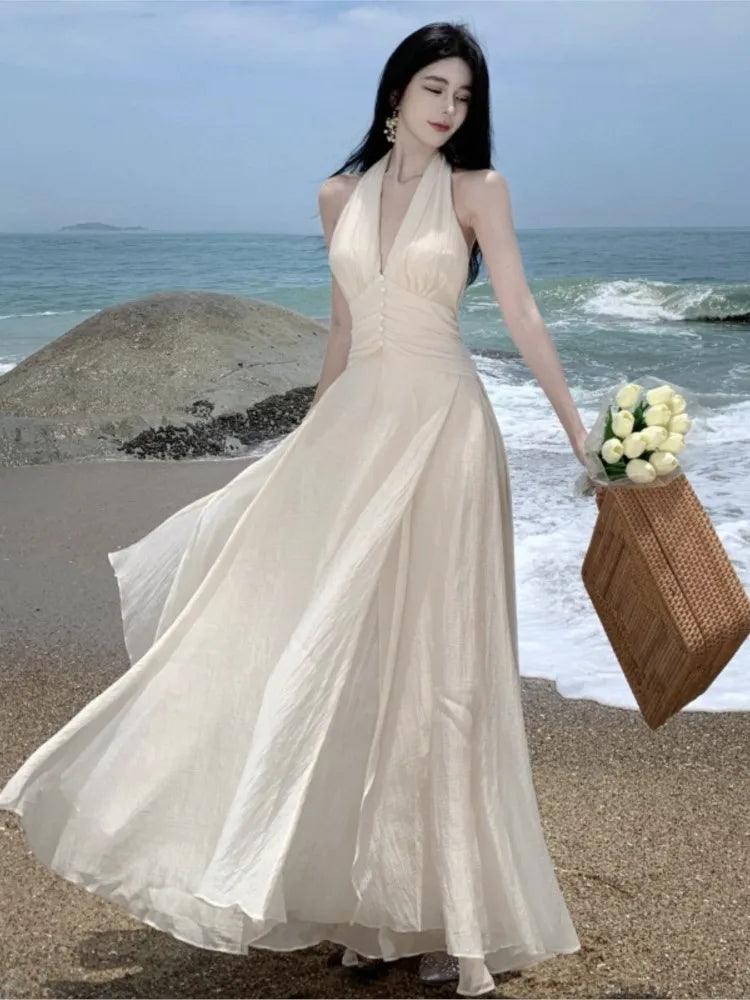 Elegant White Maxi Dress: Halter Gown for Summer Beach Wedding - Shop Now Fashionable Sheer Maxi Dress